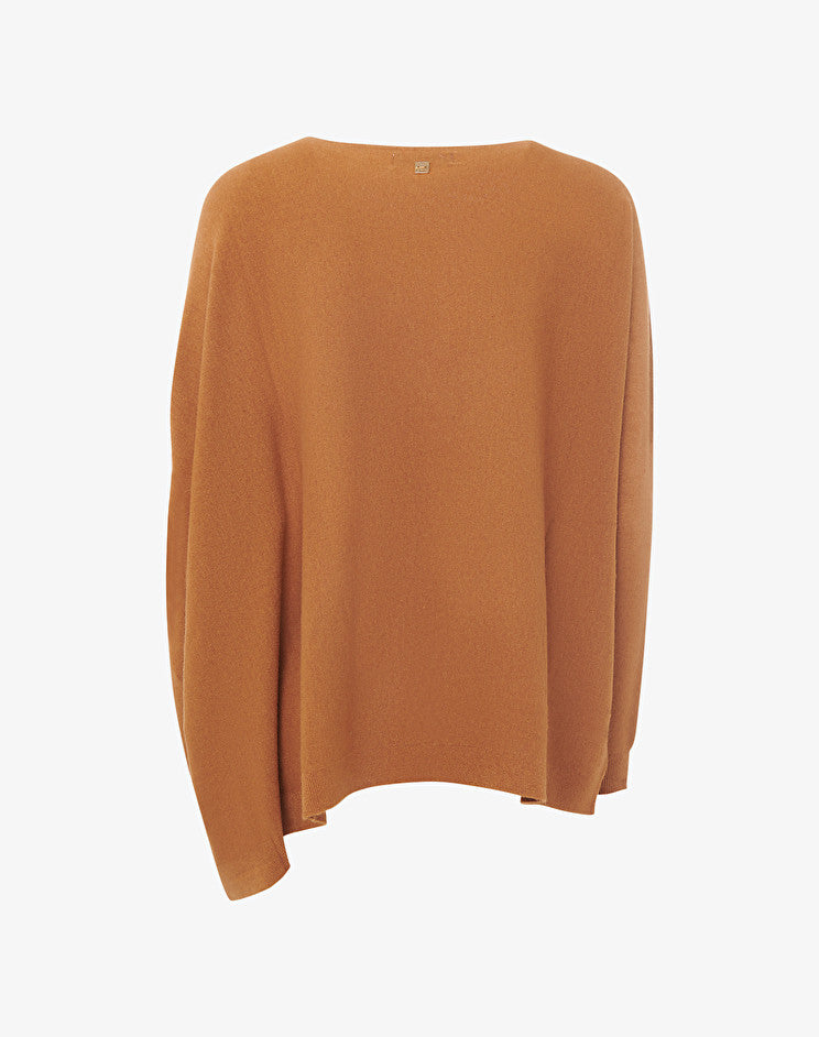 Jersey poncho con una manga naranja